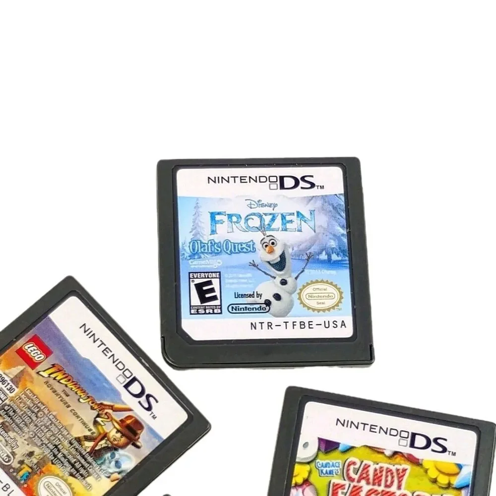 Nintendo DS Game Lot of 4 - Frozen, LEGO Indiana Jones, iCarly 2, Candy Factory